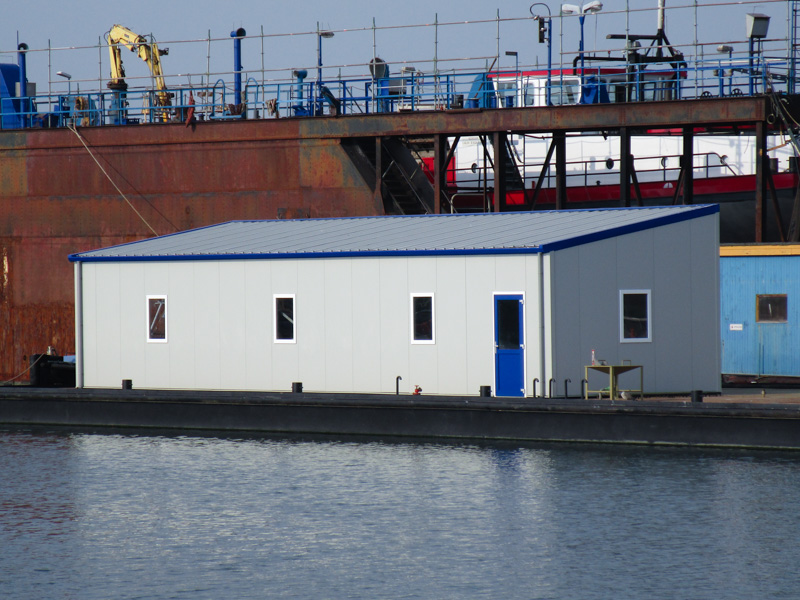 Bouw van werkplaats en opslagloods op ponton voor Damen op Texel